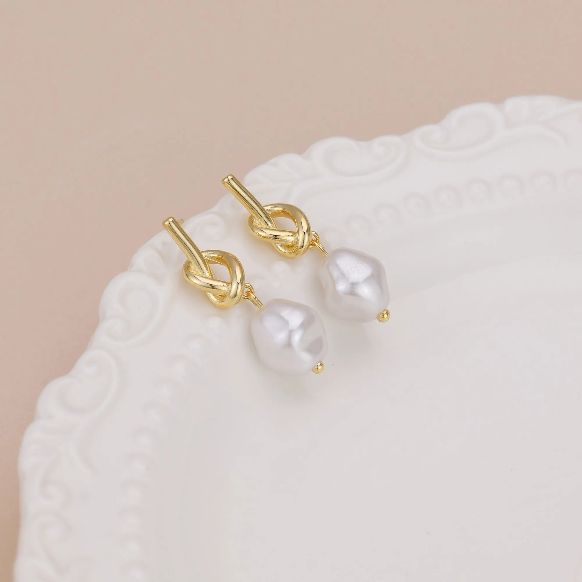 E161 love knot pearl dangle stud earrings