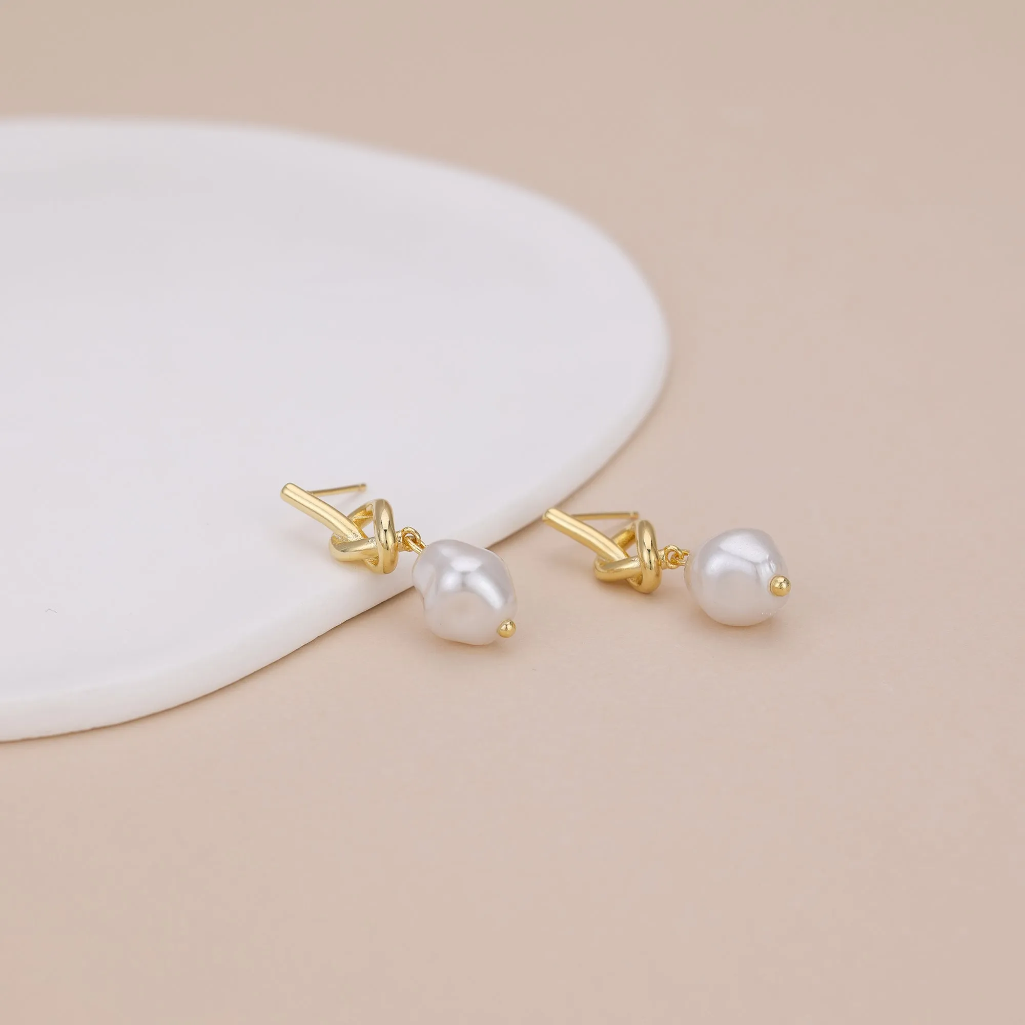 E161 love knot pearl dangle stud earrings