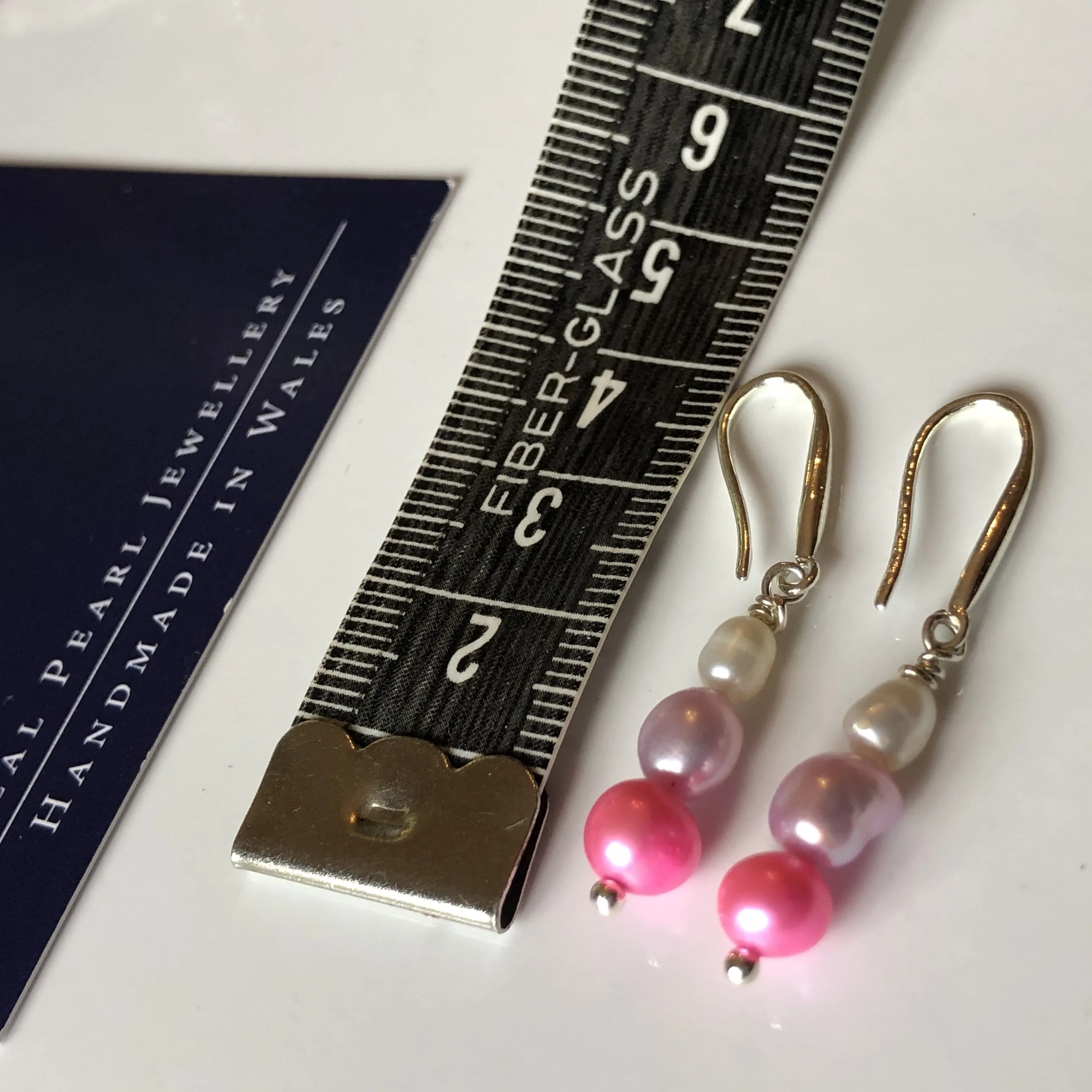 Earrings: Pink, ivory and lilac triple pearl drop earrings