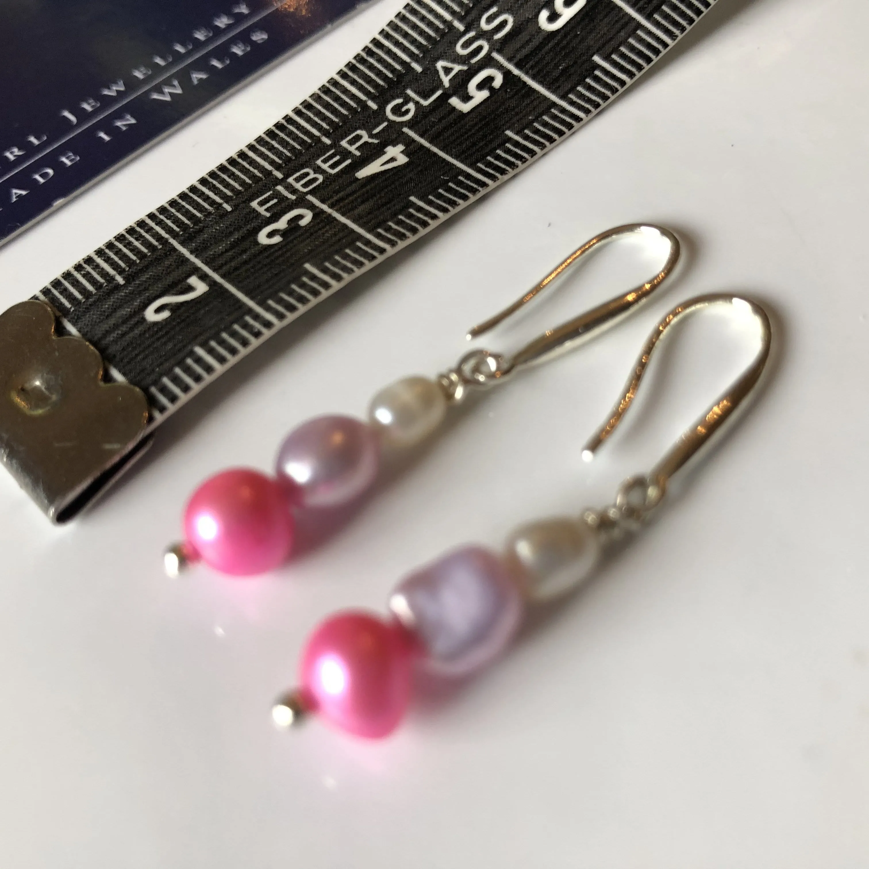 Earrings: Pink, ivory and lilac triple pearl drop earrings