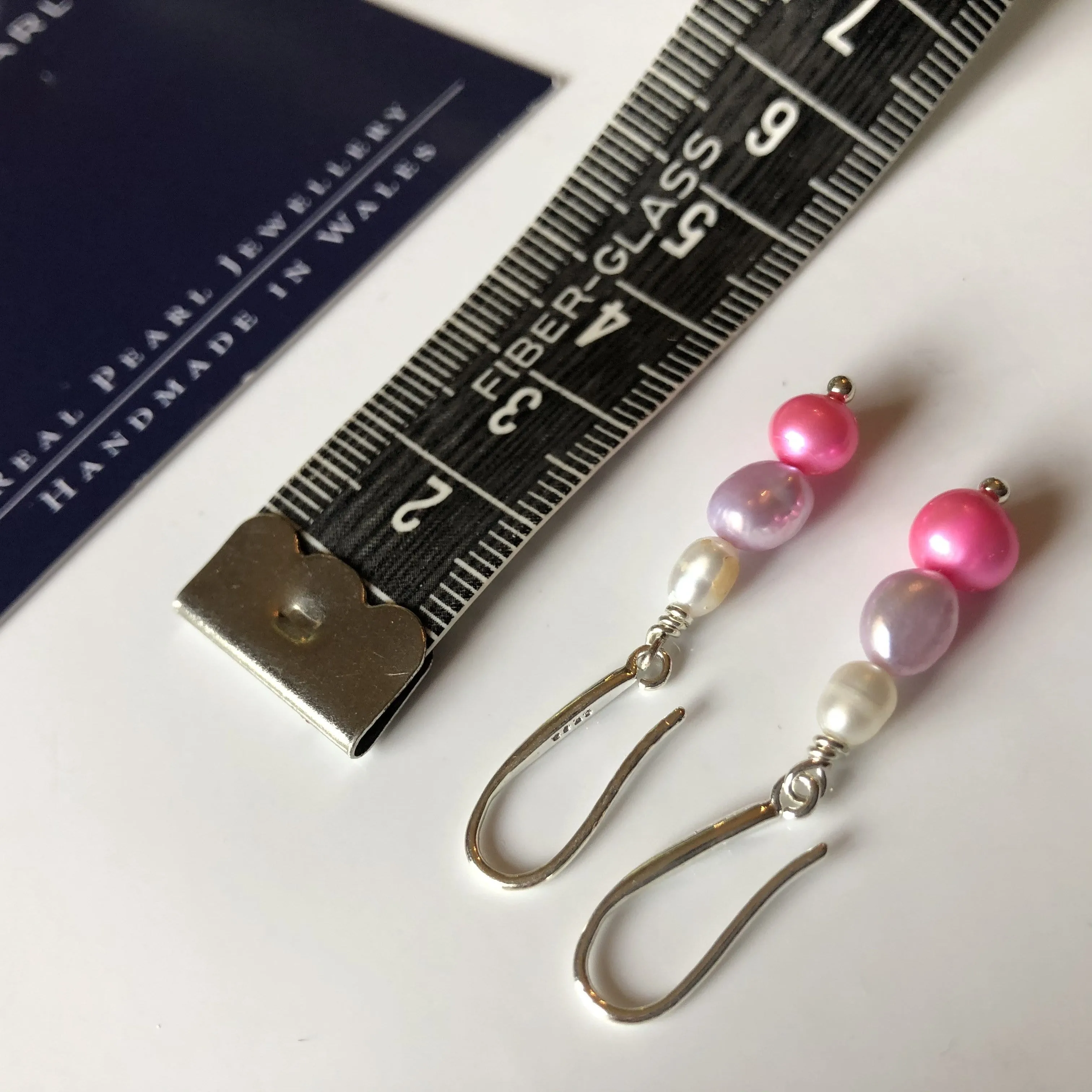 Earrings: Pink, ivory and lilac triple pearl drop earrings