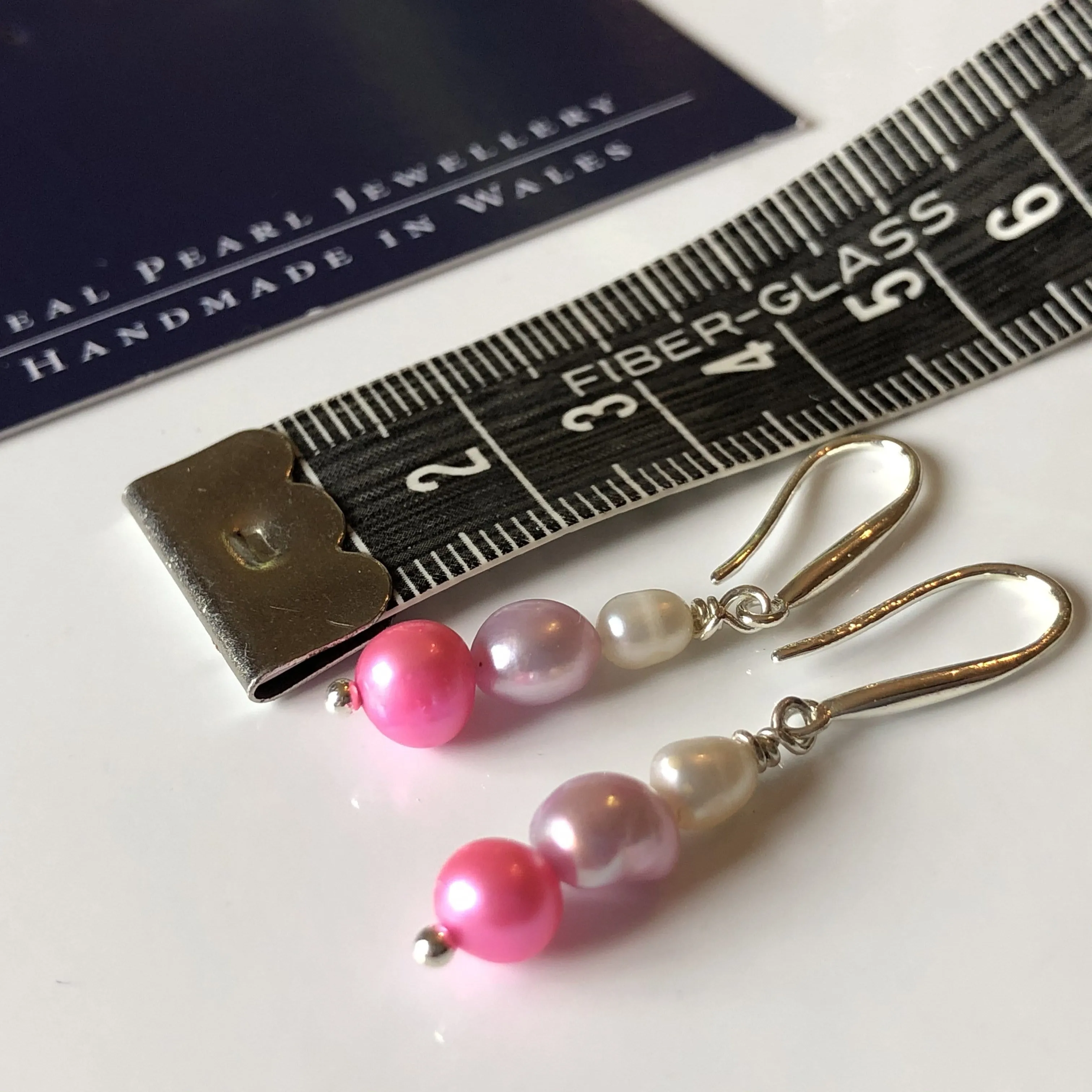 Earrings: Pink, ivory and lilac triple pearl drop earrings