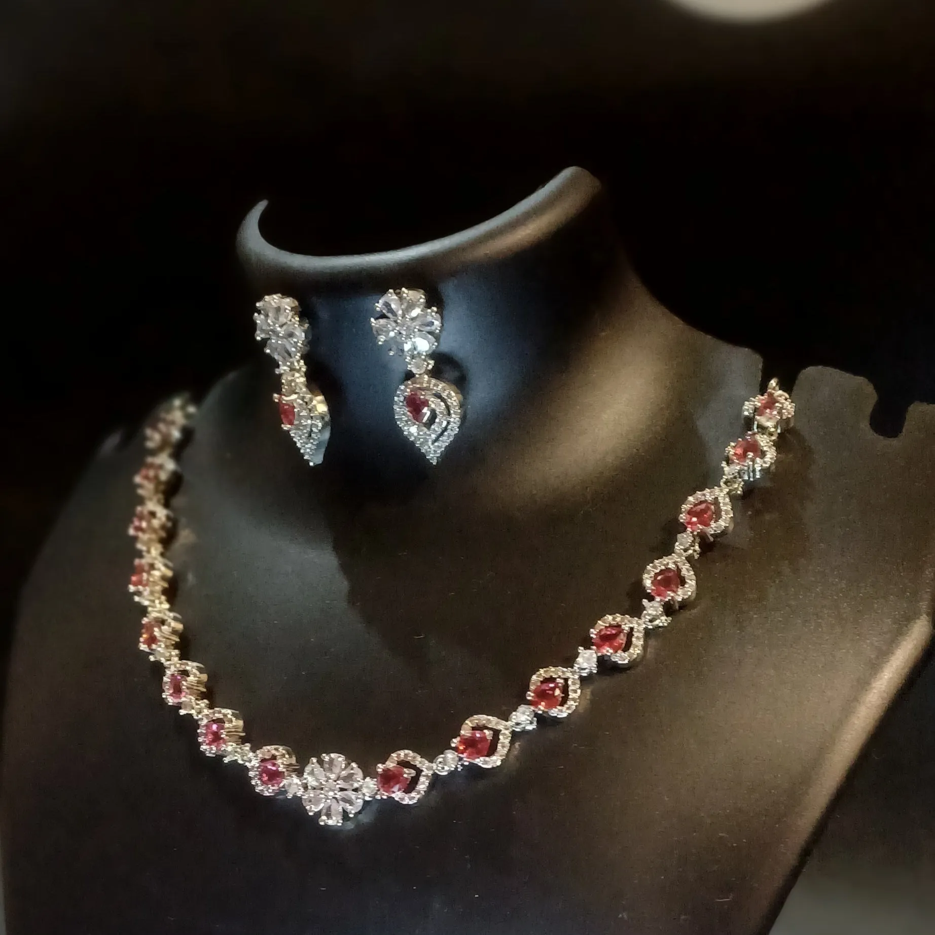 Royal pink diamond neckline with designer earrings