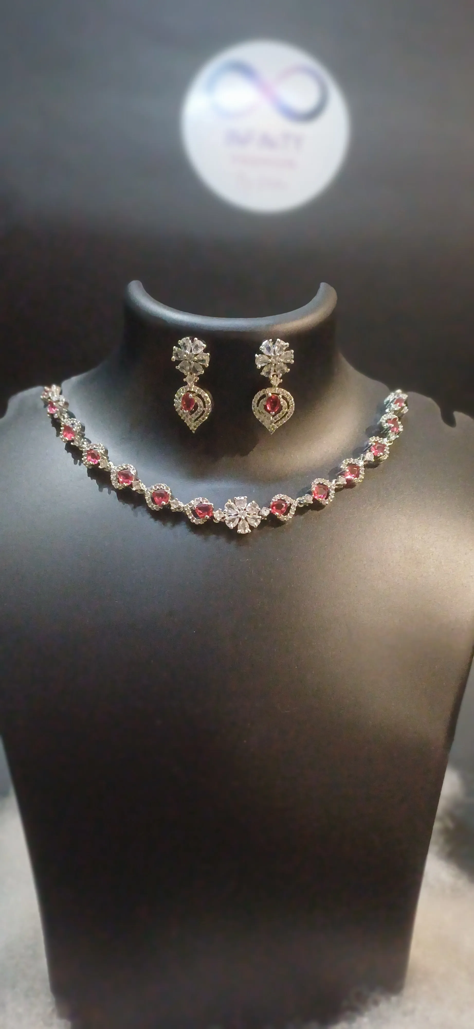 Royal pink diamond neckline with designer earrings